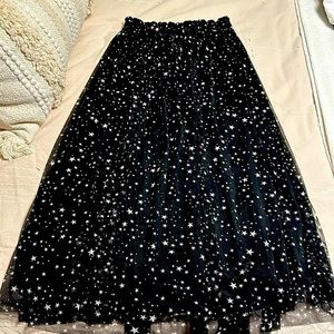 Sheer black tile like skirt with liner